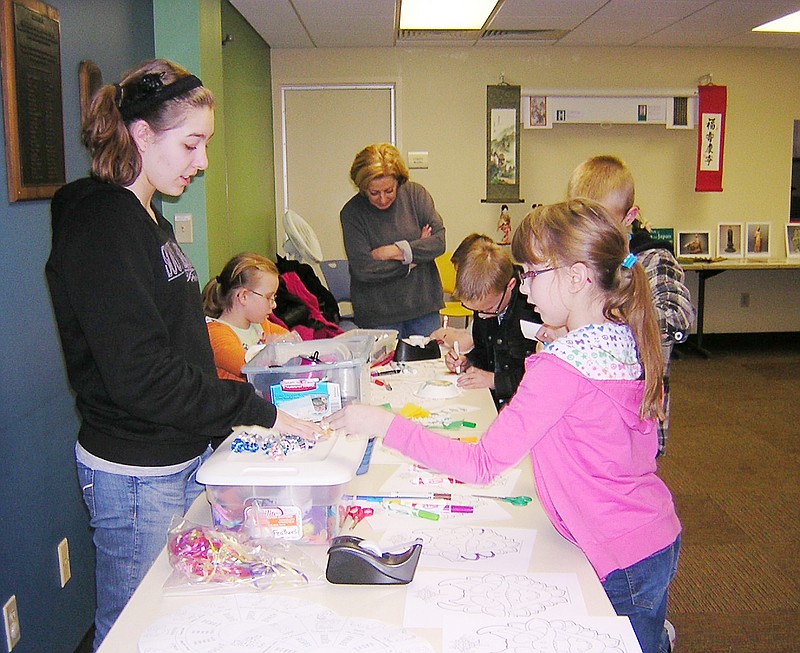 Children participate in crafts during the Callaway County's Lunar New Year celebration in 2011. This year's event - aiming to teach children about the Year of the Dragon - will be held from 4-5 p.m. on Jan. 25.          