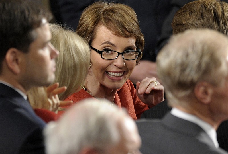 Retiring Rep. Gabrielle Giffords, D-Ariz., smiles on Capitol Hill prior to President Barack Obama's State of the Union address Tuesday.