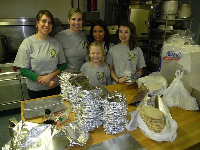 A group of volunteers who helped wrap tortillas for the Authentic Mexican Meal Fundraiser held at the California Nutrition Center Sunday, Jan. 29.