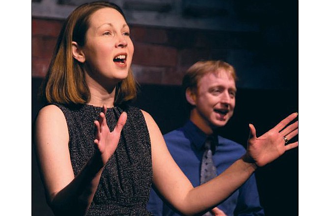 Michelle Baker and Dustin Allison rehearse for the Capital City Players' production "Songs for a New World." 