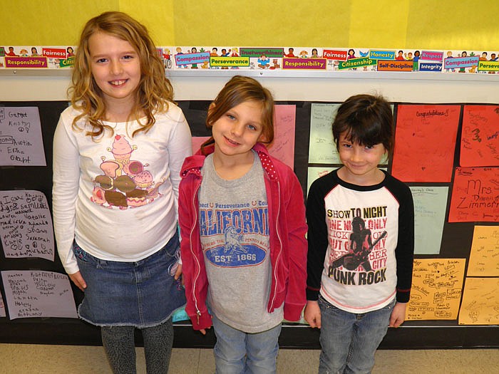 California Elementary School Students of the Week for Feb. 3, from left, are first graders Emma Russell, Savanna Lee and Kamryn Henggeler. Ryland Carlyle was not present.