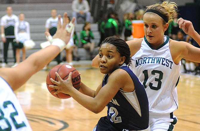 Cierra Emerson of Lincoln drives to the basket during Wednesday night's women's game.