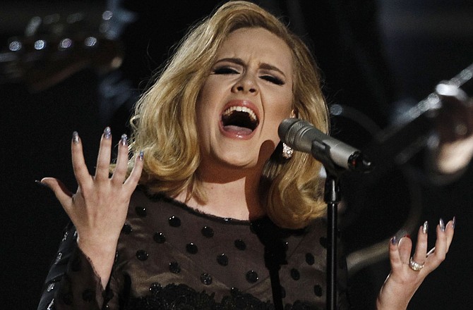 Adele performs during the 54th annual Grammy Awards on Sunday in Los Angeles.
