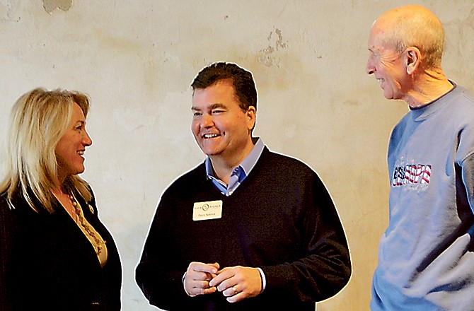 Dave Spence, center, Republican candidate for governor, chats with Rep. Jeanie Riddle, R-Mokane, and Dean Powell, chairman of the Callaway County Republican Committee, during a campaign luncheon meeting in Bek's Restaurant in Fulton.