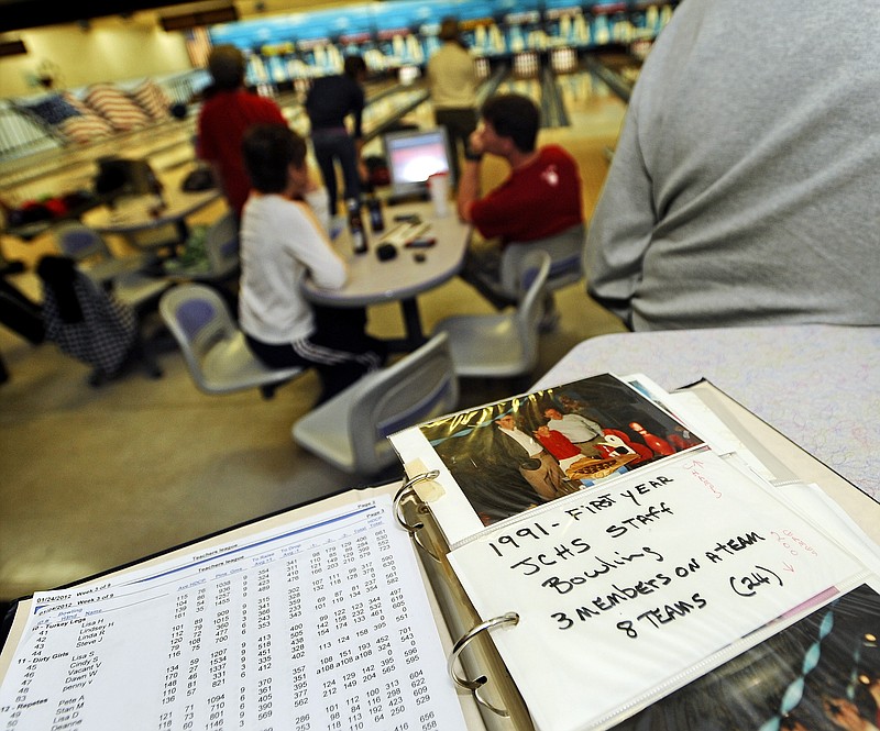 A scrapbook keeps mementos from past years in the JCPS bowling league.