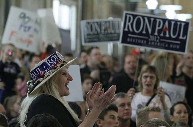 Supporter Donna Otoya chants as she waits for Republican presidential candidate Rep. Ron Paul, R-Texas, to speaks at a rally held at Union Station, Saturday, Feb. 18, 2012, in Kansas City, Mo. 