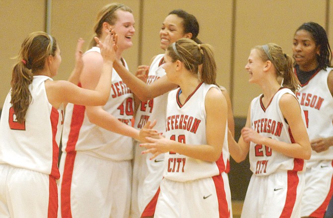 The Jefferson City Lady Jays celebrate after a win earlier this season at Fleming Fieldhouse. The Lady Jays hope to celebrate after two more wins this week at the Class 4 district tournament in Sedalia.