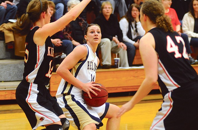 Olivia Hackmann and the Helias Lady Crusaders will look to defend their district title starting tonight in Eldon.