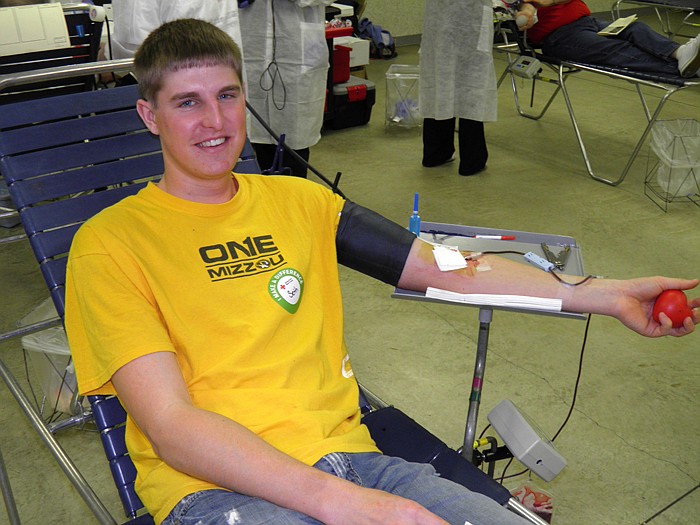 Seth Rohrbach donates blood at the Eager Eagles 4-H Club Red Cross Blood Drive held Friday, Feb. 17, at the Jamestown Community Building.