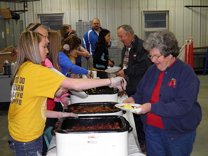 Scrambled eggs, pancakes, sausage and bacon were served along with milk, apple and orange juice at the FFA Breakfast.