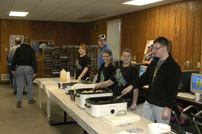 Serving the visitors at the California FFA Breakfast on Thursday morning are, from left, Lauren Heather, Curtis Ashley, Libby Martin, Kylie Ratcliffe, and John Wolken. 