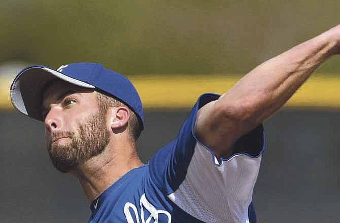 Royals pitcher Danny Duffy throws during a training session this week in Surprise, Ariz.