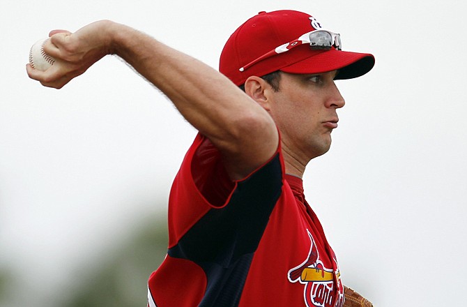 Adam Wainwright throws in spring training last month in Jupiter, Fla.