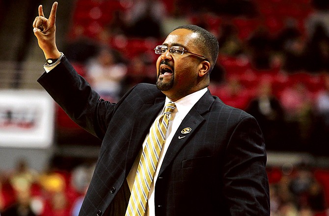 Missouri coach Frank Haith signals to his team during Saturday's game against Texas Tech in Lubbock, Texas.