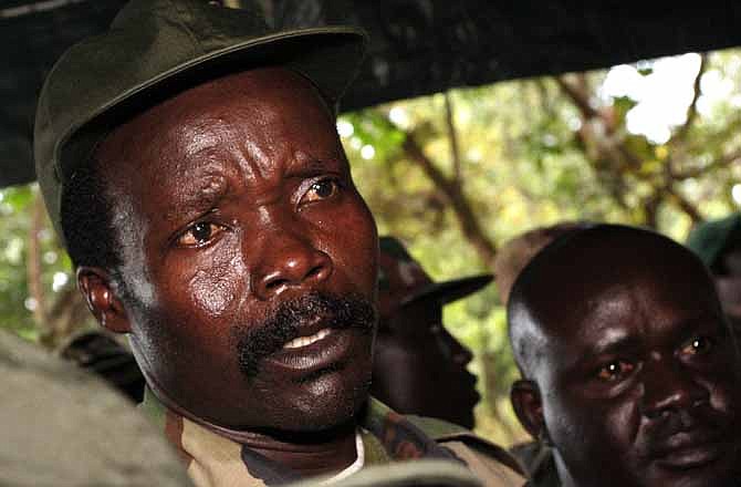 In this Nov. 12, 2006 file photo, the leader of the Lord's Resistance Army, Joseph Kony answers journalists' questions following a meeting with UN humanitarian chief Jan Egeland at Ri-Kwamba in southern Sudan. A video by the advocacy group Invisible Children about the atrocities carried out by jungle militia leader Joseph Kony's Lord's Resistance Army is rocketing into viral video territory and is racking up millions of page views seemingly by the hour. 