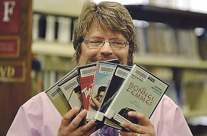 Brian Bray, assistant librarian, is the man in charge of DVDs at Missouri River Regional Library in Jefferson City.