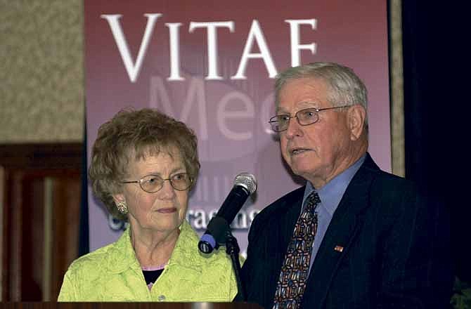 Don and Ruth Ann Schnieders deliver the hosts' comments prior to the The Vitae Caring Foundation's 16th Annual Pro-life Benefit Dinner at the Capitol Plaza Hotel in Jefferson City.