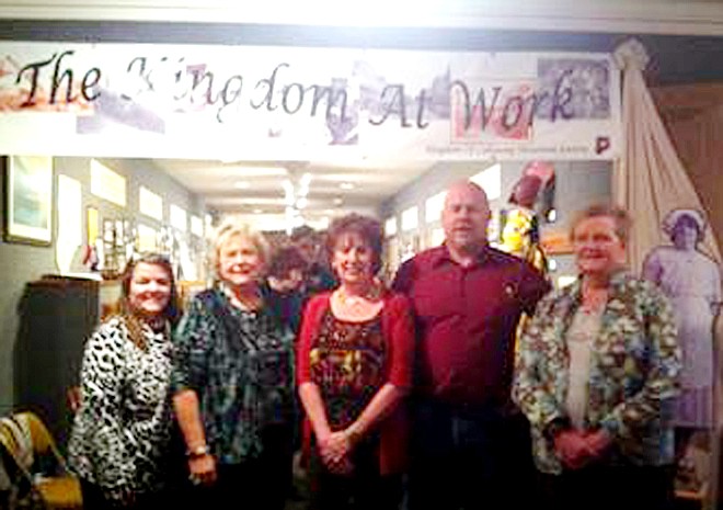 Visiting "The Kingdom At Work" display at the Churchill Museum in Fulton are Callaway County Presiding Commissioner Gary Jungermann, second from right, along with Central Missouri workforce development professionals, from left, Joyce Davis, Jan Vaughn, Cathy Groves and Mary Hughes. The Callaway County work display was next to the traveling Smithsonian Exhibition "The Way We Worked."