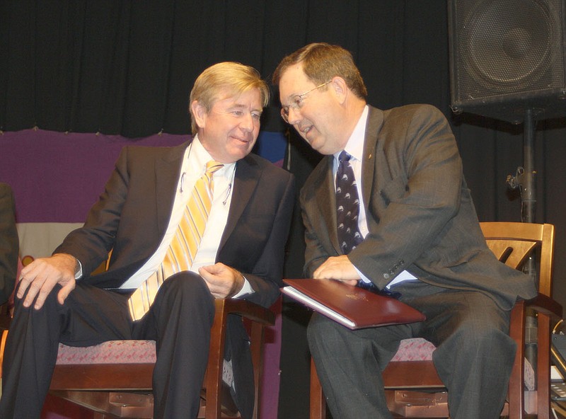 2012 Kingdom of Callaway Supper Guest of Honor Rick Brown (left) and President Mike Boulware share a moment before the program begins at William Woods University's Amy Shelton McNutt Campus Center Tuesday night. The purpose of the Kingdom Supper is to honor the achievements of a native Callawegian who has gone on to achieve success outside "The Kingdom."