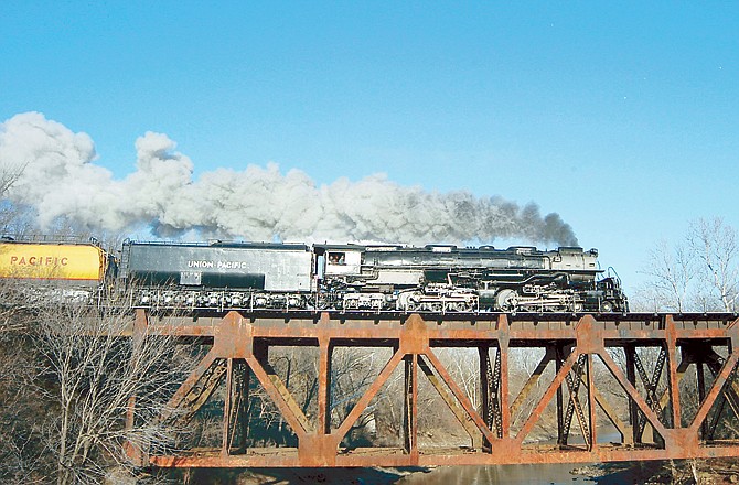 The Union Pacific Challenger engine makes its way across the Moreau River railroad bridge in Cole County on its way to St. Louis.