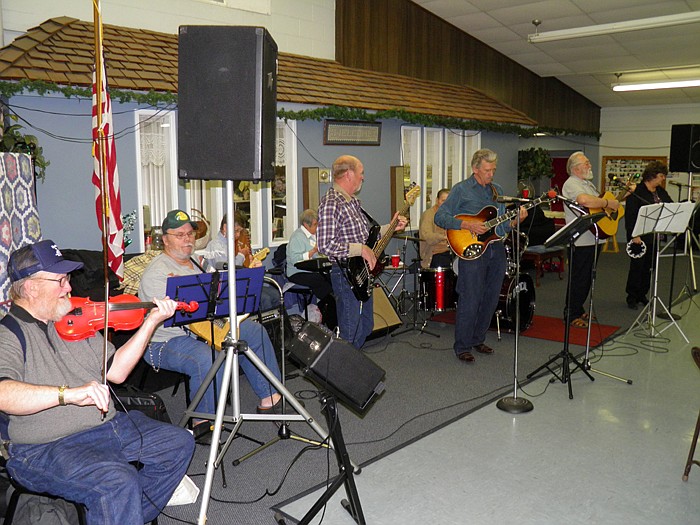 "R.E. and the Country Airs" perform with local "jammers" at the California Nutrition Center Spaghetti Dinner/Open House held Sunday, March 11.