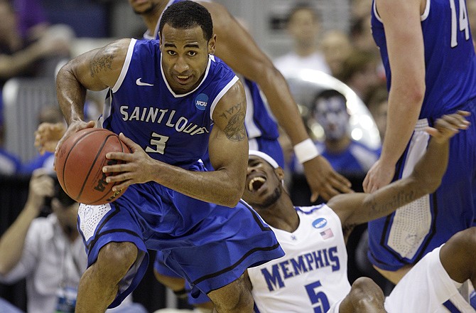 Saint Louis' Kwamain Mitchell, steals the ball during Friday's win againt Memphis in the NCAA Tournament. 