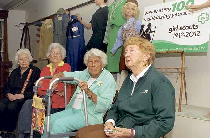 From left, Elizabeth Hawkins, Sue Strong, Adeline Reichard and Allegra Harrison talk about their experiences in the Girls Scouts. They will share their memories of Girl Scouts as part of a special 100th Anniversary of Girl Scouting tea on March 25.