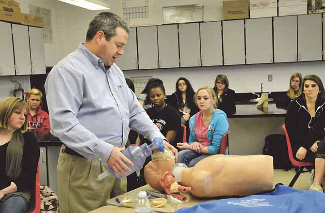 Local anesthesiologist Scott Tanner visited the Jefferson City High School Medical Club recently to talk about his profession and where his services are used. He also demonstrated on a CPR dummy and showed different ways to administer anesthetics and how to monitor breathing during surgery.