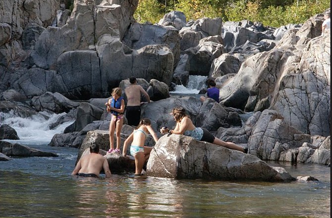 Visitors enjoy the warm sun at Johnson Shut-Ins State Park.