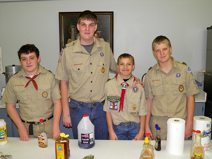 Boy Scouts who helped pour milk and juice, from left, are Jacob Heppard (lifescout), Kyle Brink (tenderfoot), Cory Friedmeyer (tenderfoot) and Gregory Schroeter (first class).