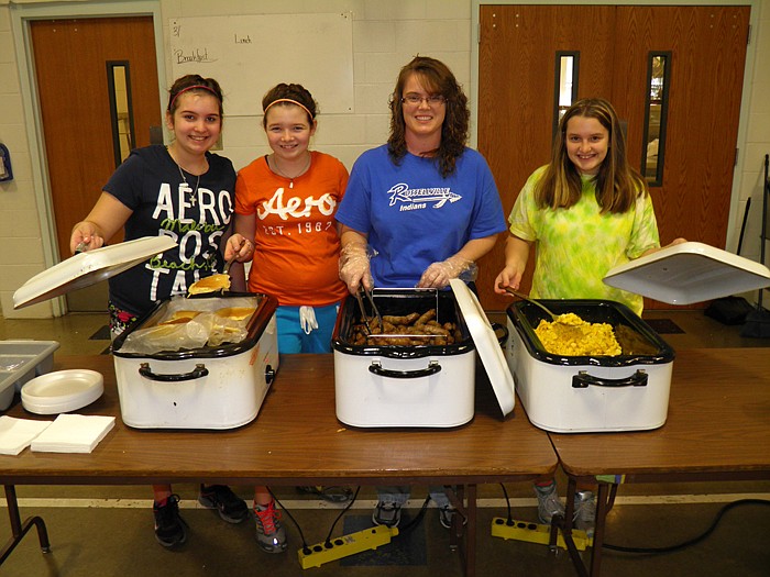 Russellville Teacher Cindy Wieberg and students who helped serve pancakes, eggs and sausage, from left, are Brianna McKinney, Makayla Stubinger, Wieberg and Klara Stiffler.