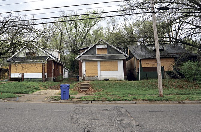 Boarded up properties on Jefferson City's Layfette Street near East Miller will be the new home for the Quinn AME Chapel. 