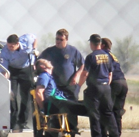 Emergency workers tend to a JetBlue captain who had a "medical situation" Tuesday during a flight that landed in Amarillo, Texas. 