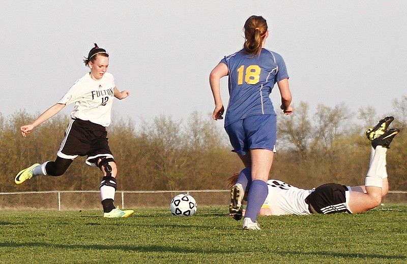 Fulton junior midfielder Adrienne Ebersole lines up for a shot in the first half of the Lady Hornets' 5-0 victory over Fatima in Tuesday night's home opener. Ebersole -Â still recovering from a ACL tear in her left knee a year ago -Â scored three first-half goals to power Fulton.