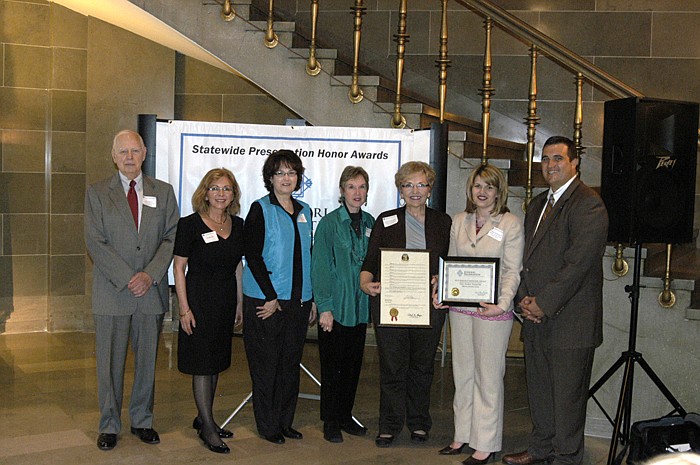 Members of Friends of the Finke Theatre with Rep. Caleb Jones at the ceremony awarding the Missouri Preservation Award on Wednesday, March 21, at the State Capitol Rotunda. From left are Gail Hughes, Pamela Hill, Carolyn Miller, Vicky Schroeder (representing CPI), Marj Friedmeyer, Sarah Holtsclaw and Rep. Caleb Jones.