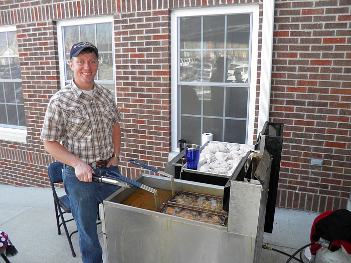 Joe Liebi, pictured, and Fred Rosslan helped fry the chicken at the California First Baptist Church 2012 London Olympic Mission Fundraiser held Sunday, March 25.