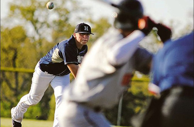 Helias starter Levi Rose delivers a pitch to a Kirksville batter during Friday night's game at the American Legion Sports Complex in Jefferson City.