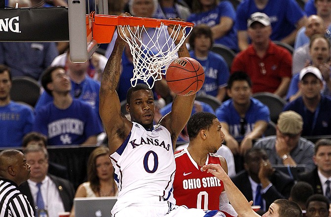 Many expect tonight's NCAA championship game to come down to a battle between Thomas Robinson of Kansas (shown) and Anthony Davis of Kentucky.