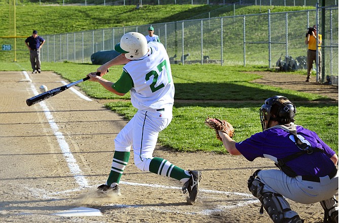 Adam Forck of Blair Oaks makes contact on a single to right field during Monday's game against Hallsville in Wardsville.