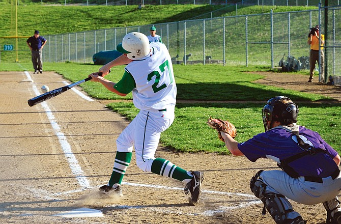 Adam Forck of Blair Oaks makes contact on a single to right field during Monday's game against Hallsville in Wardsville.
