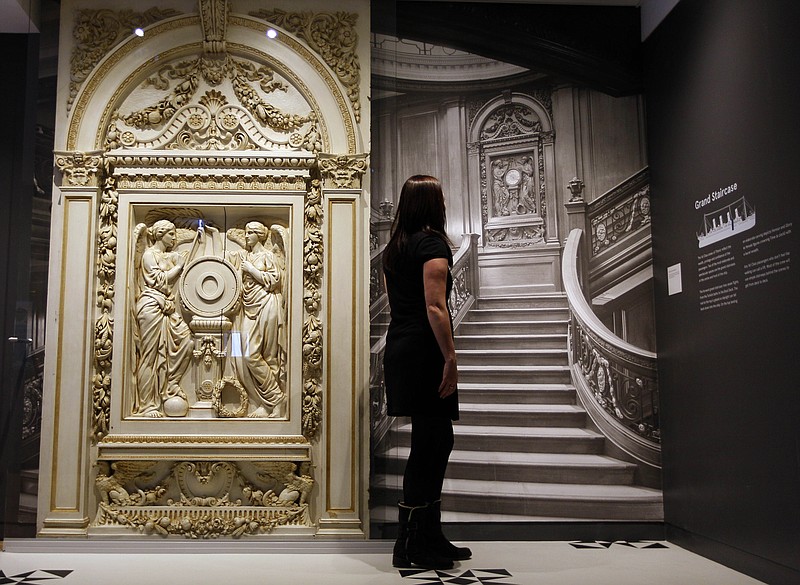 A woman looks at a photograph Tuesday of the Grand Staircase from the Titanic, at SeaCity Museum in Southampton, England. The new museum will open April 10, 100 years after the ill-fated Titanic sailed from the city's docks.