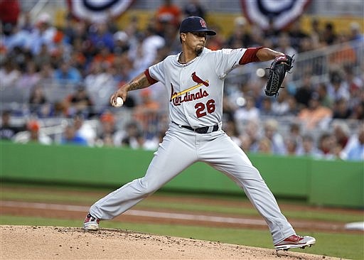 Cardinals starting pitcher Kyle Lohse delivers a pitch during the first inning of their game against the Marlins on Wednesday in MIami. 