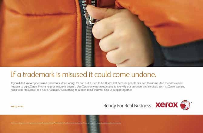 This photo provided by Xerox shows a past advertisement for Xerox attempting to defend its brand name from becoming such a common noun for copiers that it falls out of trademark protection. Meanwhile, two years after its release, and hundreds of competitors later, iPad has become the word people use when they want a tablet computer. In many consumers' minds, there are no others. 