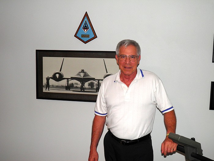 Clarksburg resident, retired Lt. Col. Gary "Gil" Luloff, who served in the Air Force flying the T-38 "Talon", F-106 "Delta Dart" and SR-71 "Blackbird," pictured behind Luloff.