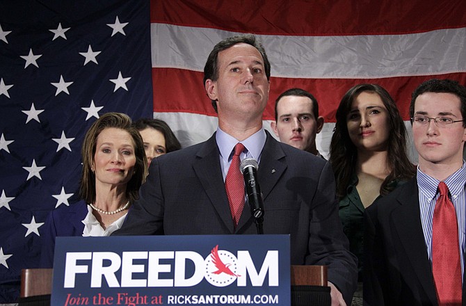 Surrounded by his family Republican presidential candidate, former Pennsylvania Sen. Rick Santorum announces he is suspending his candidacy effective Tuesday in Gettysburg, Pa.