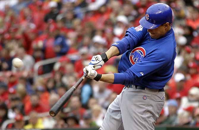 Chicago Cubs' Bryan LaHair hits a grand slam during the third inning of a baseball game against the St. Louis Cardinals, Friday, April 13, 2012, in St. Louis.