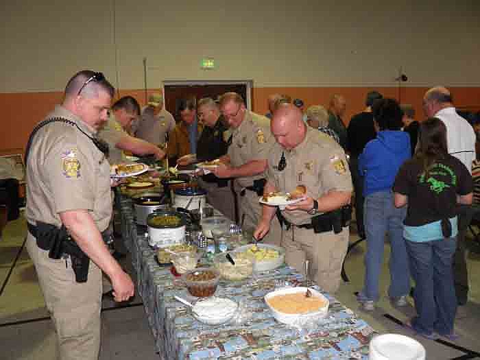 Active and retired law enforcement officers from Moniteau and Morgan County as well as Missouri State Troop F, get home cooked turkey donated by Cargill, brisket, mashed potatoes and gravy, dressing and desserts at the dinner.