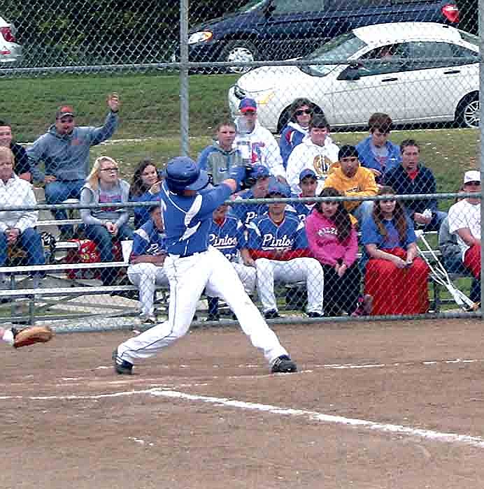 California's Tyler Silvey connects with a pitch during the first inning of the varsity game against Osage.