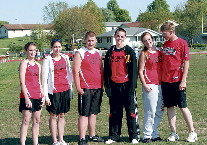 Prairie Home varsity tracksters taking a break between events at the California Invitational April 10, from left, are Brooke Emmerich, Jessie Kennedy, Jonathan Brandes, Kody Utterback, Taylor Zey and Trever Huth.