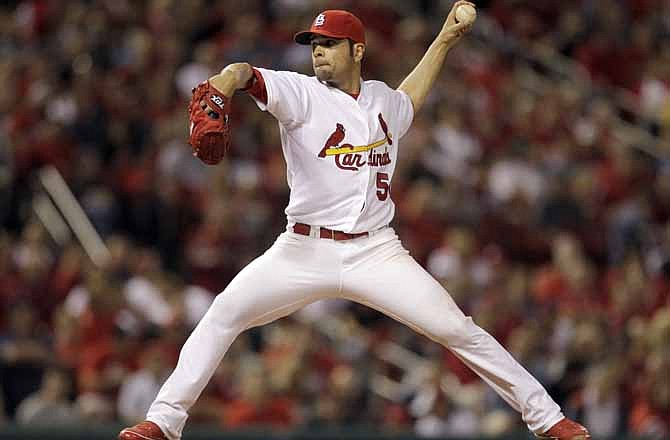 St. Louis Cardinals starting pitcher Jaime Garcia throws during the fourth inning of a baseball game against the Cincinnati Reds Wednesday, April 18, 2012, in St. Louis. 